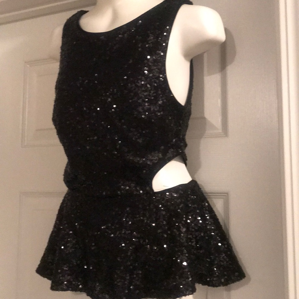 Black sequin peplum top